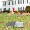 house shingle in front of home
